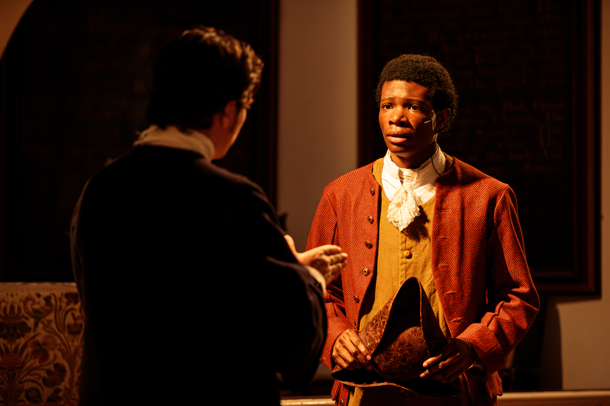 Tim Hoover as Mather Byles and Joshua Lee Robinson as Cato. 